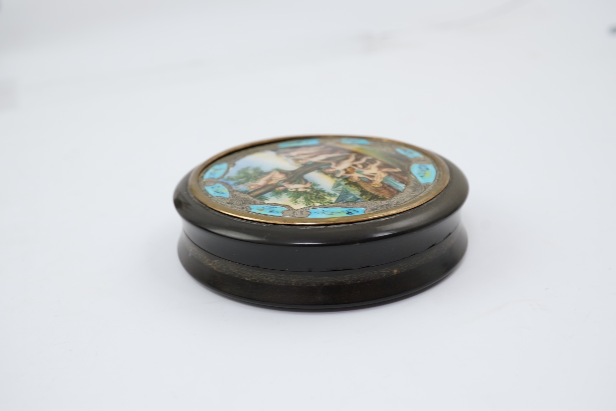 A 19th century Italian? silver and enamel mounted circular tortoiseshell box and cover